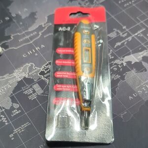 Orange and Silver Voltage Tester
